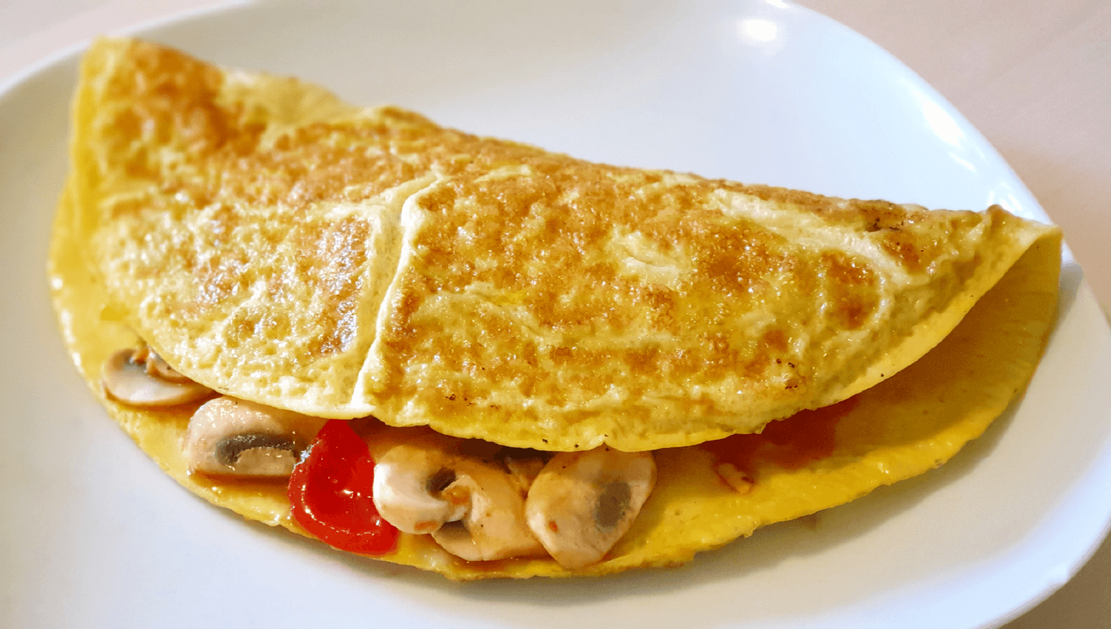 Frühstücksomelette mit Tomaten Frühstücksomelette mit Tomaten